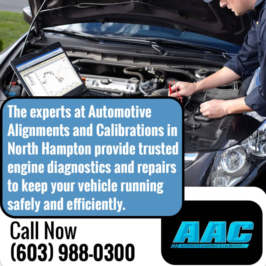 Mechanic performing engine diagnostics and battery testing on a vehicle at an auto repair shop in North Hampton
